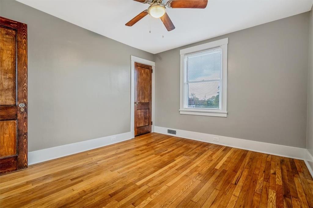 200 Spring Avenue Pittsburgh, PA 15202 - Photo 33 of 43 a view of an empty room with wooden floor and a window