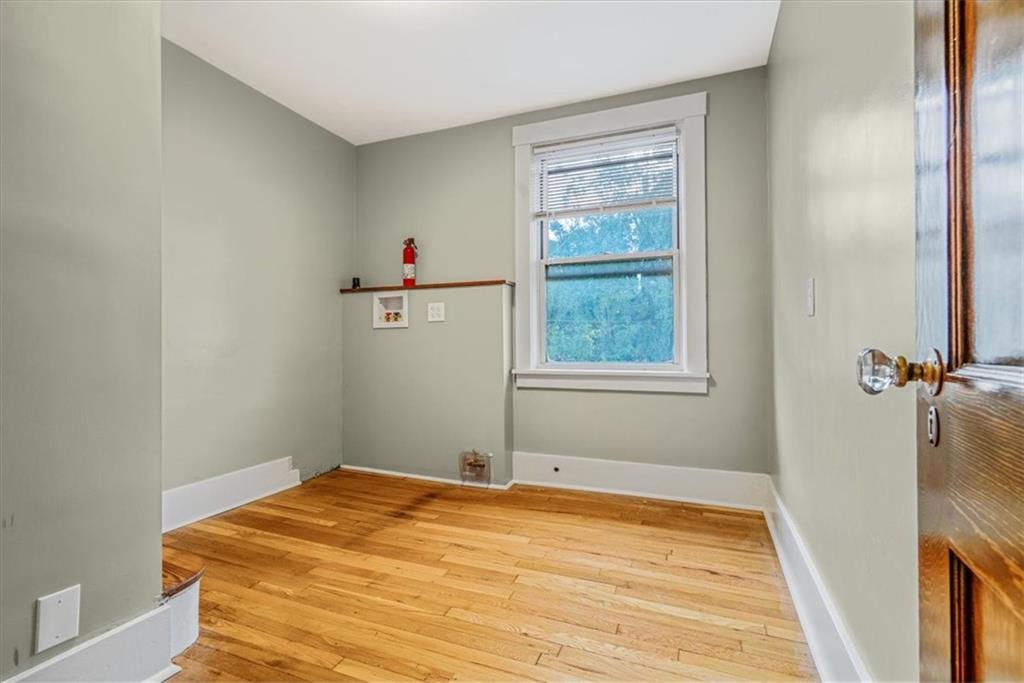 200 Spring Avenue Pittsburgh, PA 15202 - Photo 34 of 43 a bedroom with a bed and a window