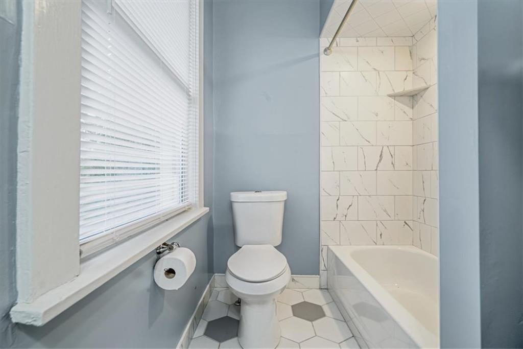 200 Spring Avenue Pittsburgh, PA 15202 - Photo 36 of 43 a bathroom with a toilet a sink and bathtub