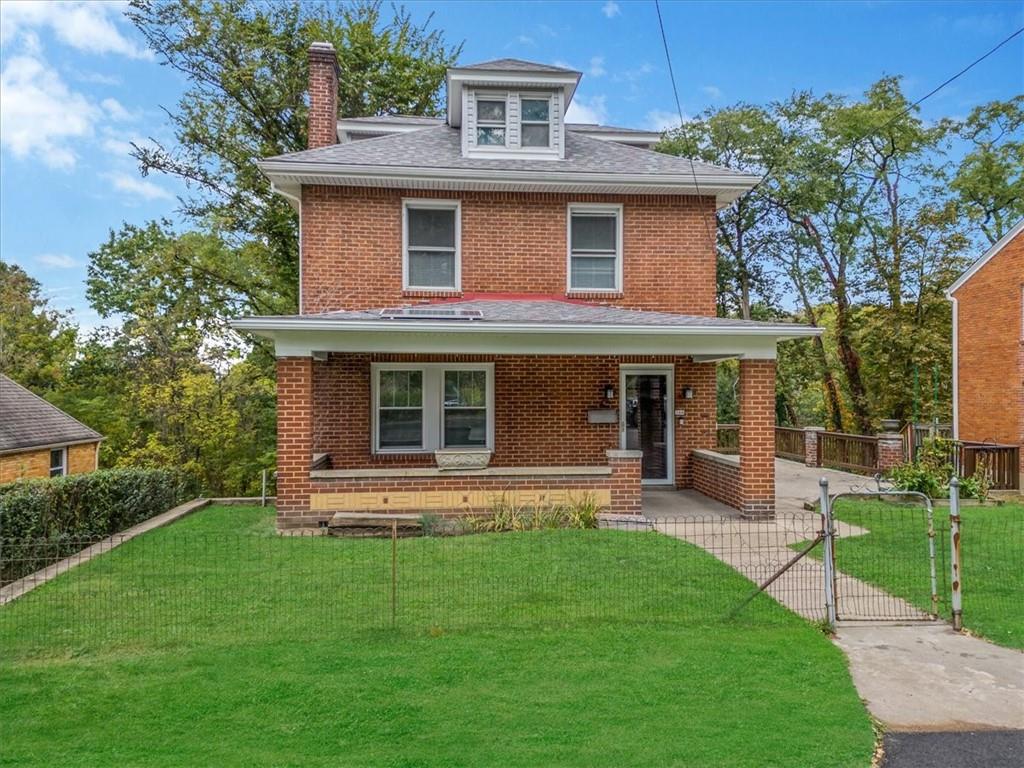 200 Spring Avenue Pittsburgh, PA 15202 - Photo 4 of 43 a front view of a house with a yard table and chairs