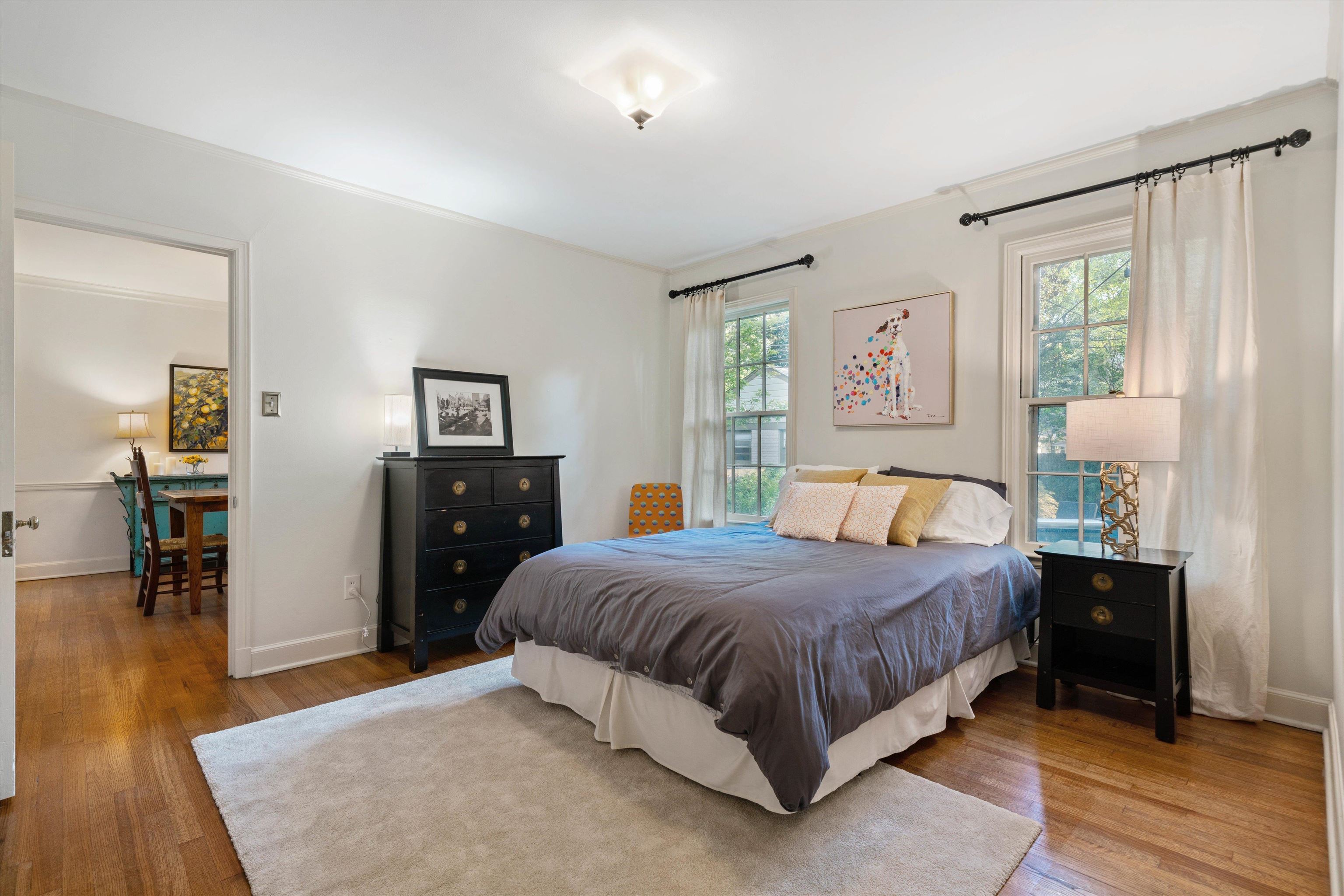 4053 North Rose Road Memphis, TN 38117 - Photo 16 of 26 a bedroom with a bed and wooden floor