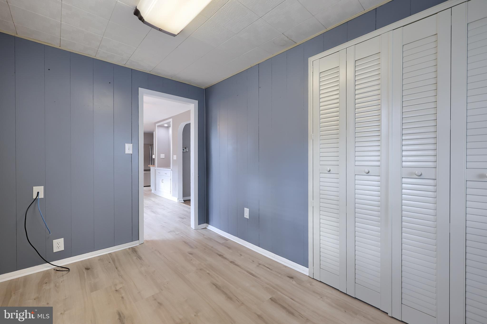 705 Summit Drive Dallastown, PA 17313 - Photo 21 of 50 a view of a room with wooden floor and bathroom