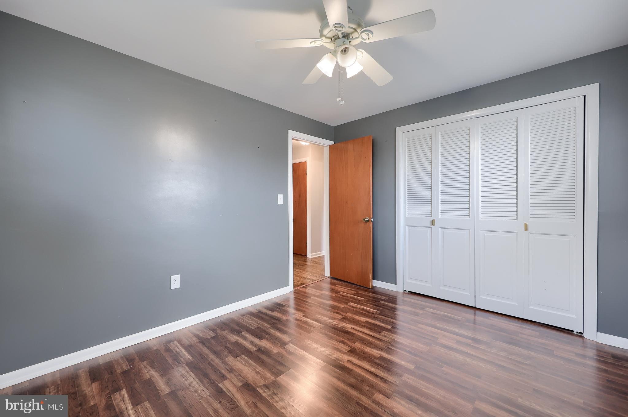705 Summit Drive Dallastown, PA 17313 - Photo 23 of 50 a view of an empty room with wooden floor