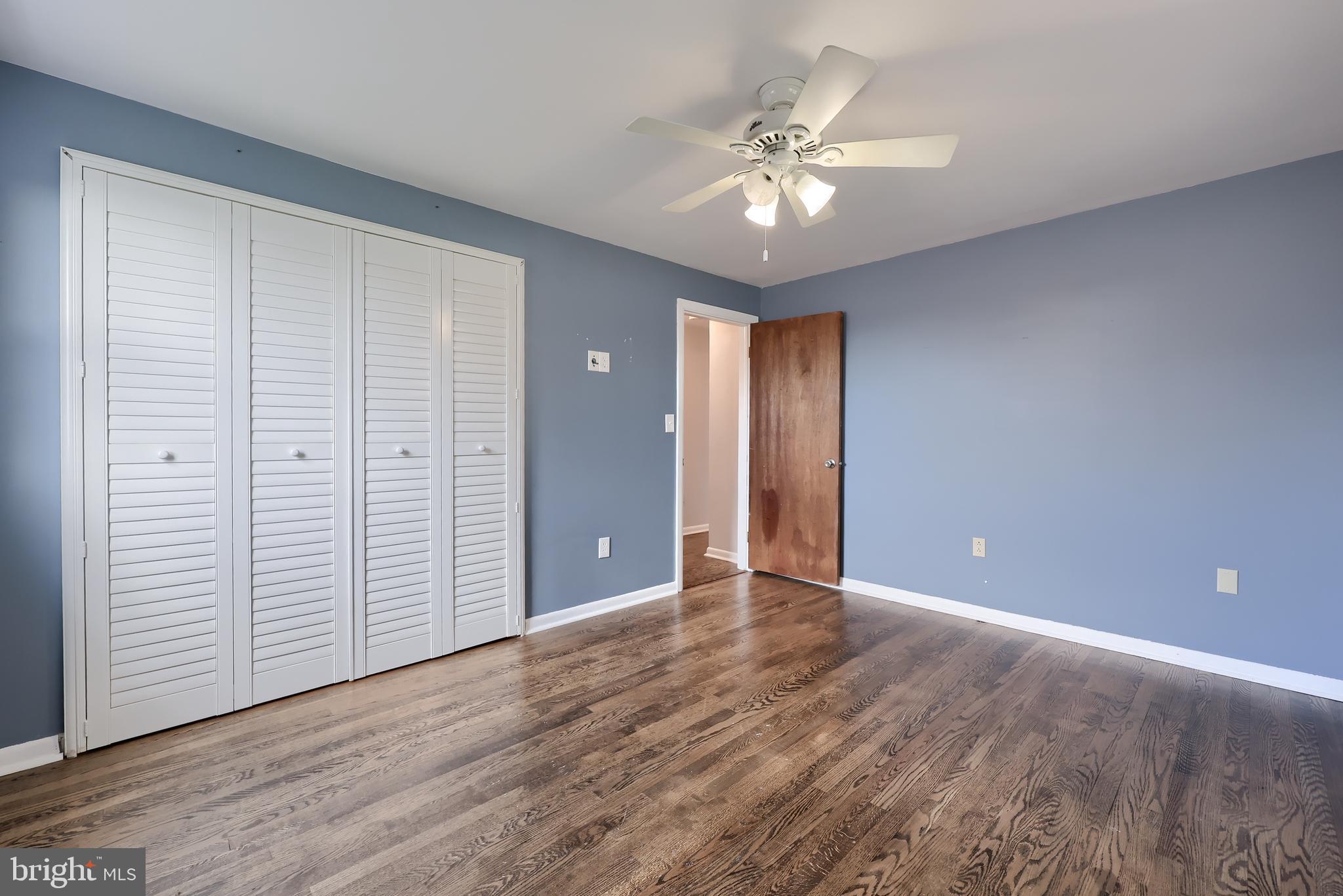 705 Summit Drive Dallastown, PA 17313 - Photo 25 of 50 a view of an empty room with wooden floor
