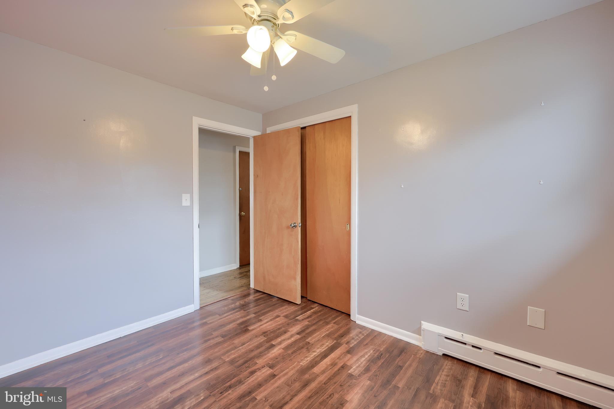 705 Summit Drive Dallastown, PA 17313 - Photo 27 of 50 a view of an empty room with wooden floor