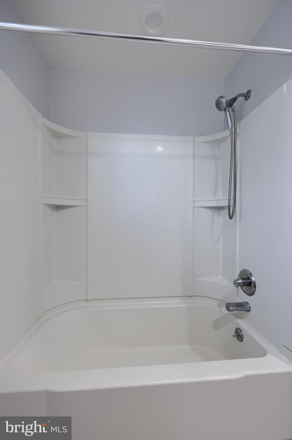 705 Summit Drive Dallastown, PA 17313 - Photo 29 of 50 a bathroom with a bathtub