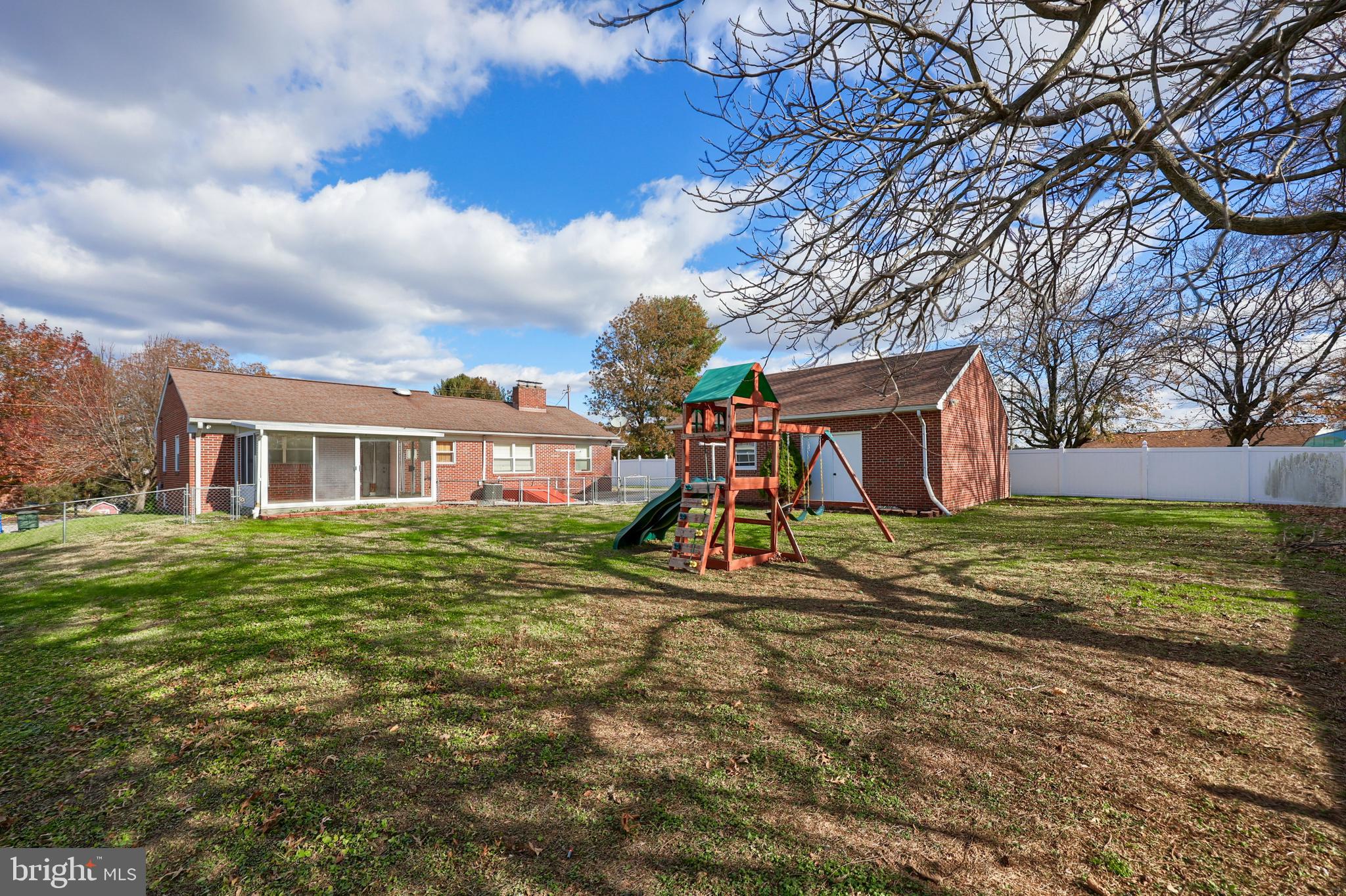 705 Summit Drive Dallastown, PA 17313 - Photo 3 of 50 a view of a house with a yard