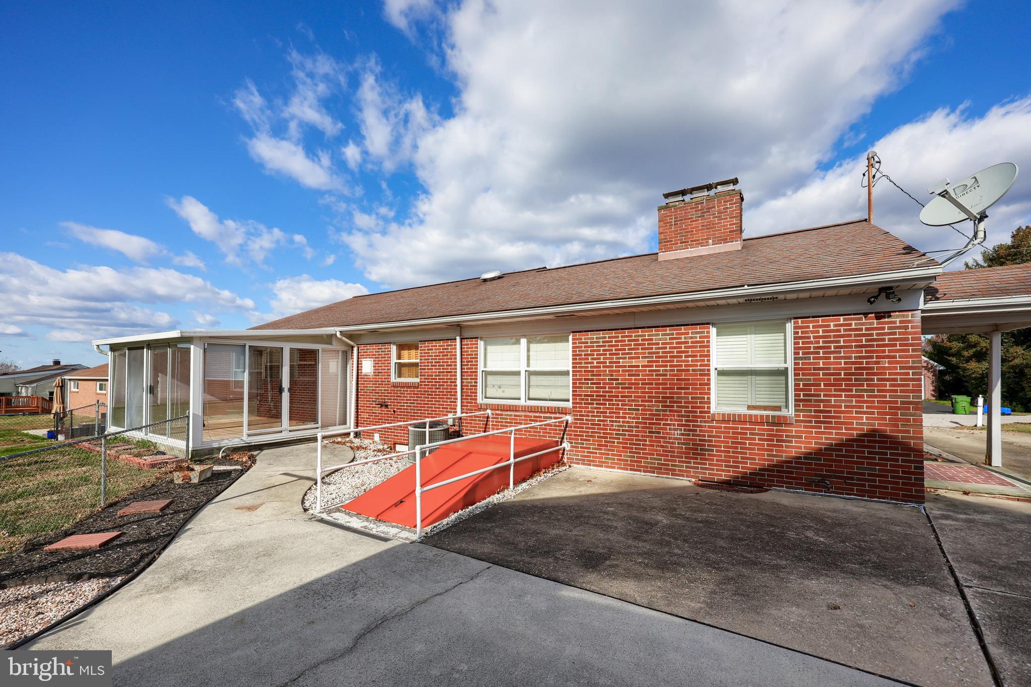 705 Summit Drive Dallastown, PA 17313 - Photo 41 of 50 a backyard of a house with barbeque oven table and chairs