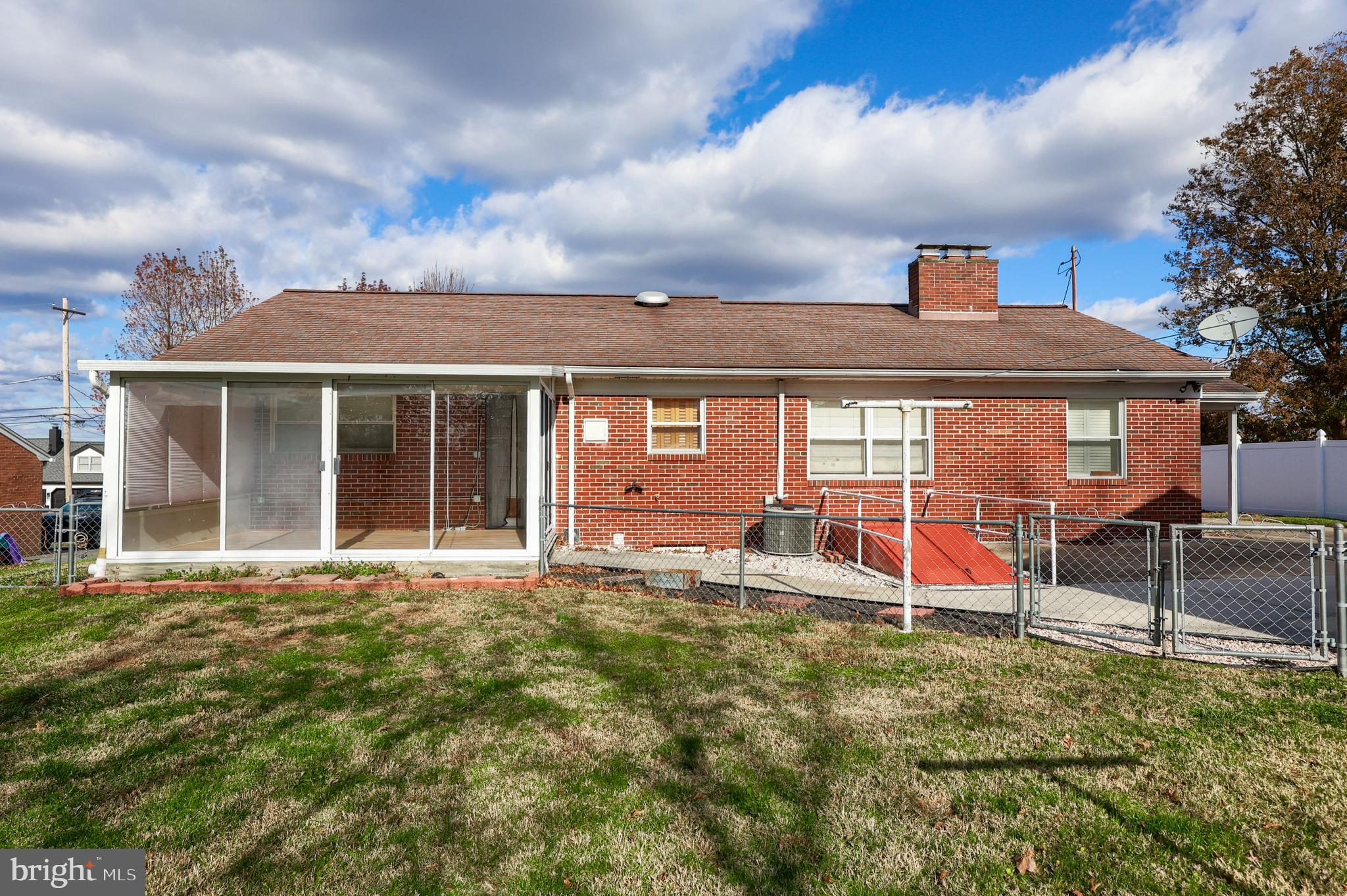 705 Summit Drive Dallastown, PA 17313 - Photo 42 of 50 front view of a house with a yard