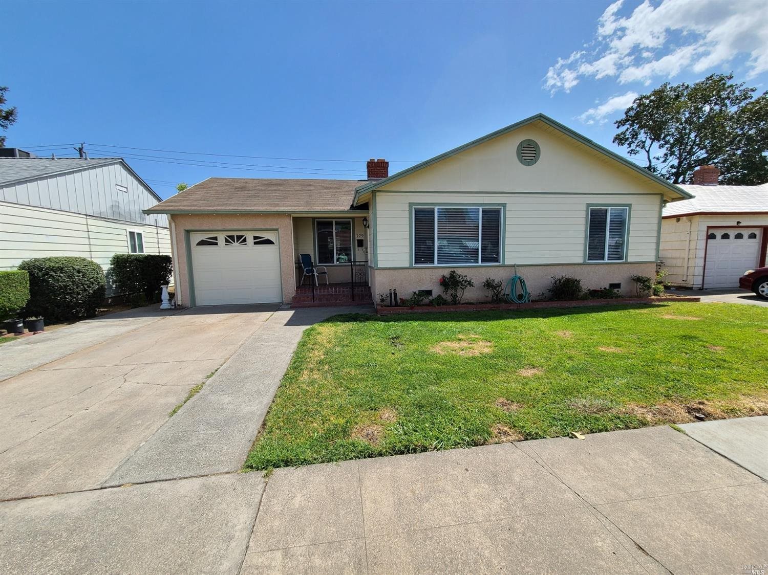 129 Maple Street Vacaville, CA 95688 - Photo 1 of 14 a front view of house with yard and green space