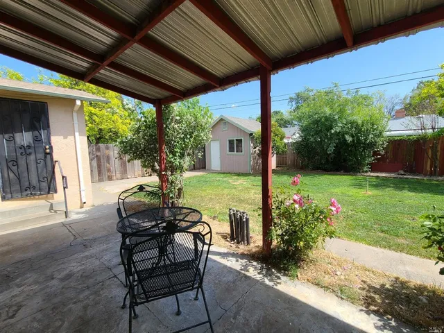 a garden view with a seating space