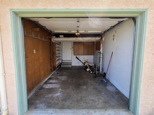 a view of a hallway to a room