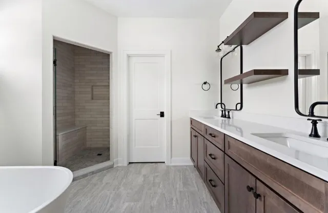 a bathroom with a sink and mirror