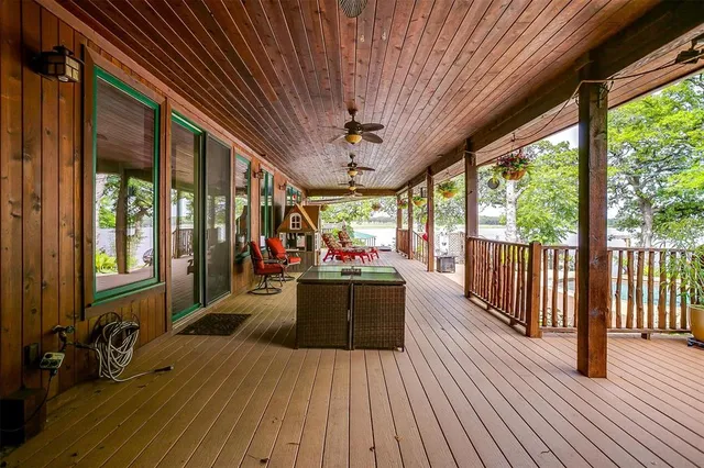 a view of a house with porch and wooden floor
