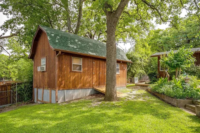 a view of a yard with swimming pool