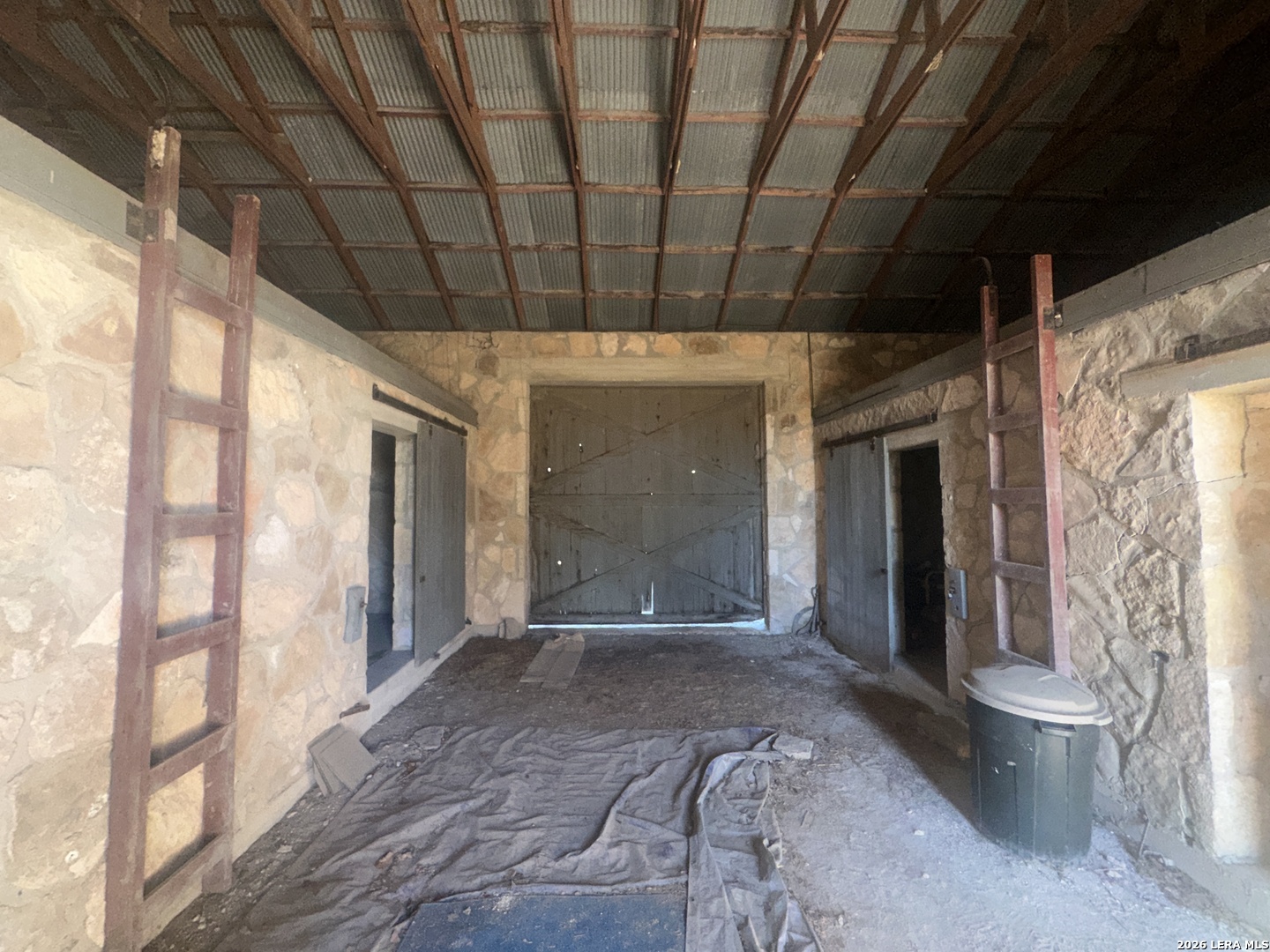 526 Cielo Rio Drive Pipe Creek, TX 78063 - Photo 13 of 14 a view of interior space with sliding door and wooden floor