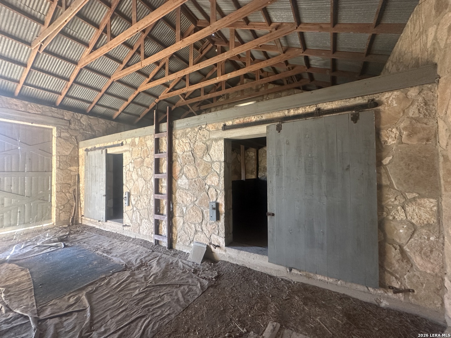 526 Cielo Rio Drive Pipe Creek, TX 78063 - Photo 4 of 14 a bed room with a bed and a window