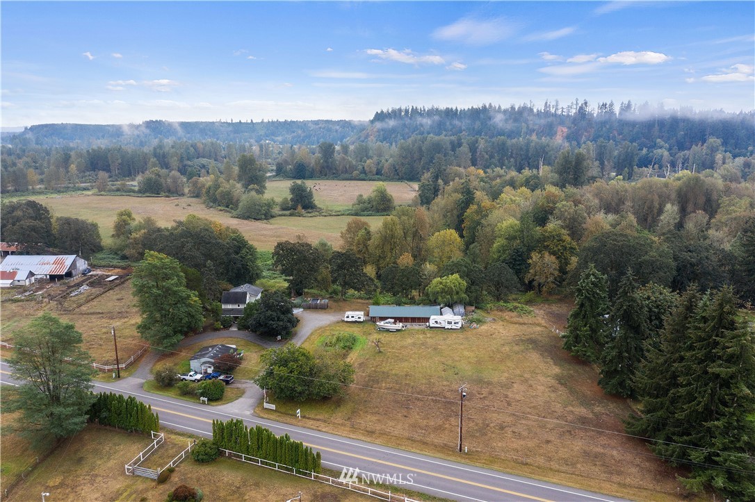 8123 James Road Southwest Rochester, WA 98579 - Photo 34 of 38 an aerial view of a town with couple of houses