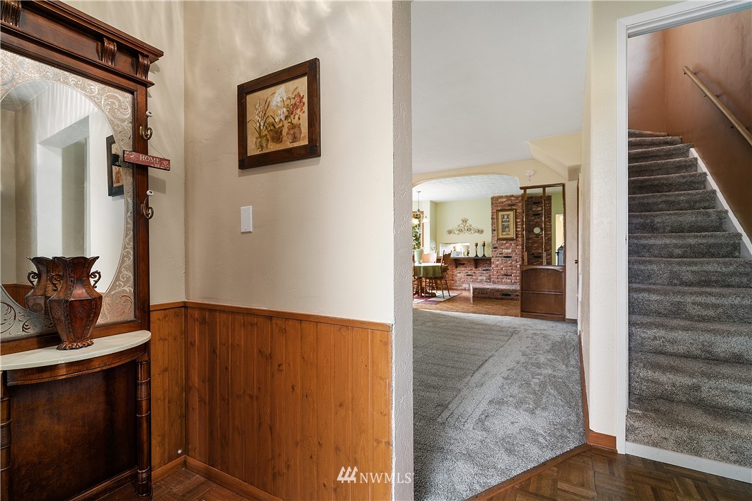 8123 James Road Southwest Rochester, WA 98579 - Photo 10 of 38 a view of a hallway and a livingroom with furniture