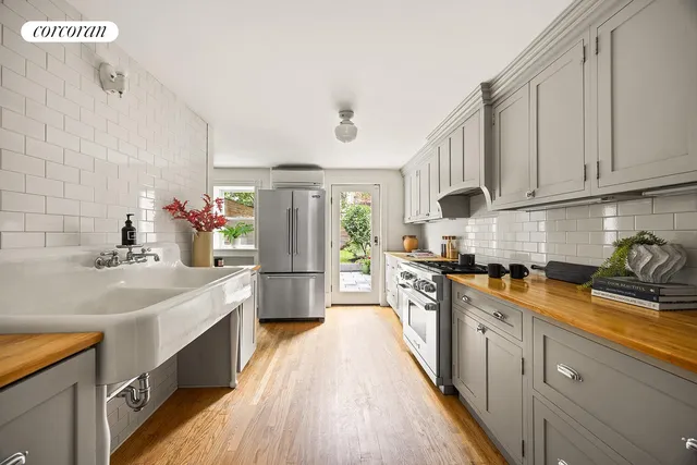 a view of a livingroom with furniture and window
