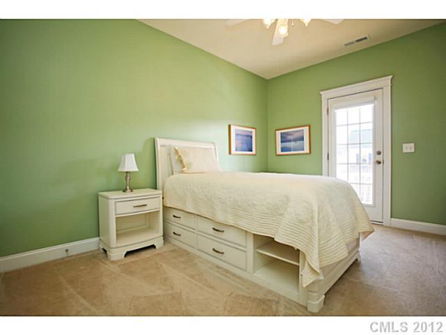 213 Mills Lane Fort Mill, SC 29708 - Photo 11 of 16 a bedroom with a bed and a window