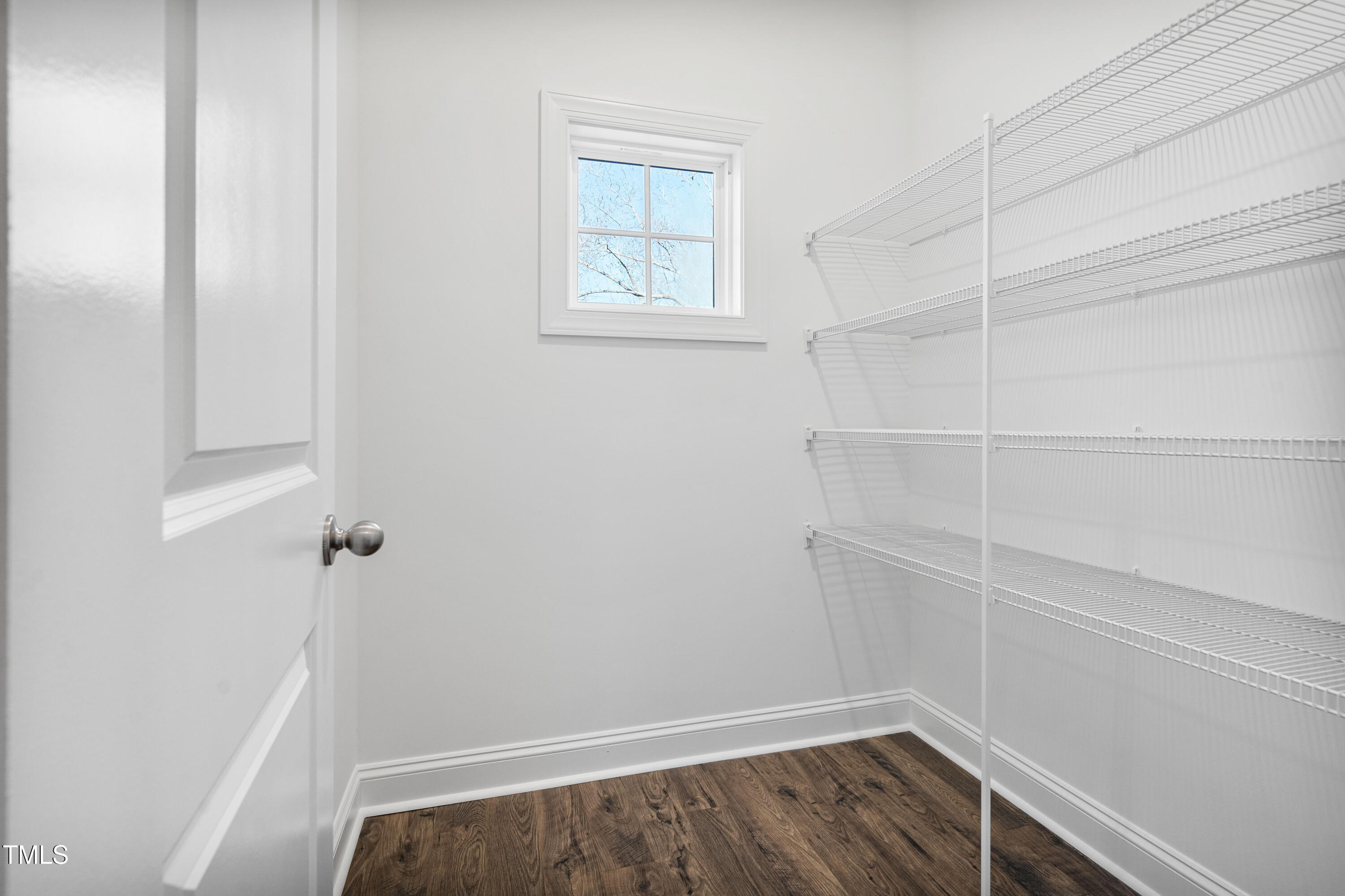 527 Forestville Road Wake Forest, NC 27587 - Photo 32 of 47 a view of small space with racks on the wall