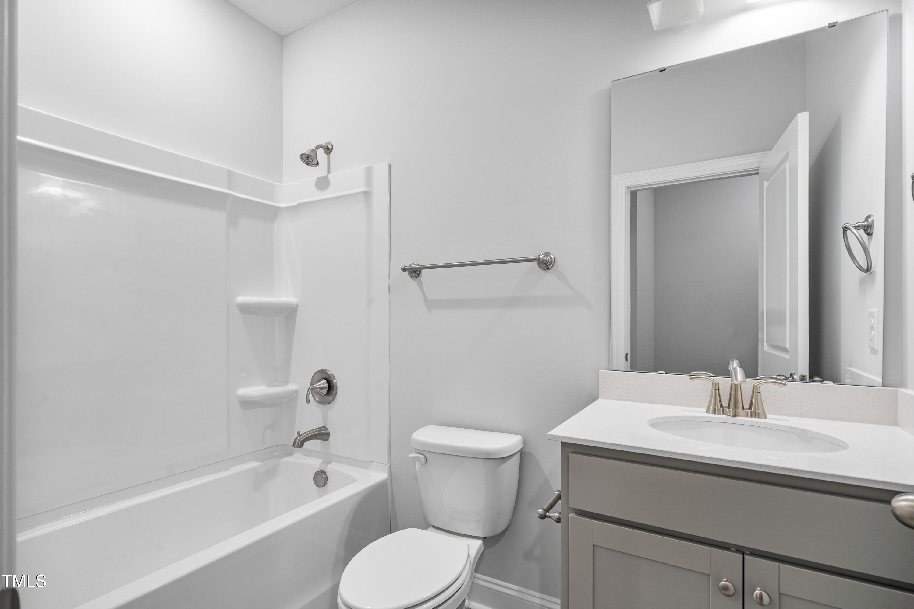 527 Forestville Road Wake Forest, NC 27587 - Photo 37 of 47 a bathroom with a sink a toilet and shower