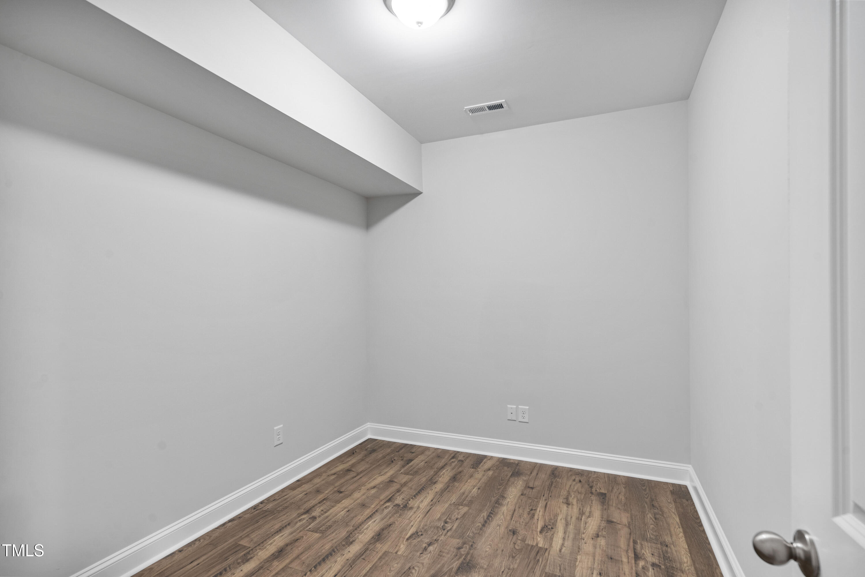 527 Forestville Road Wake Forest, NC 27587 - Photo 38 of 47 a view of small space with racks on the wall