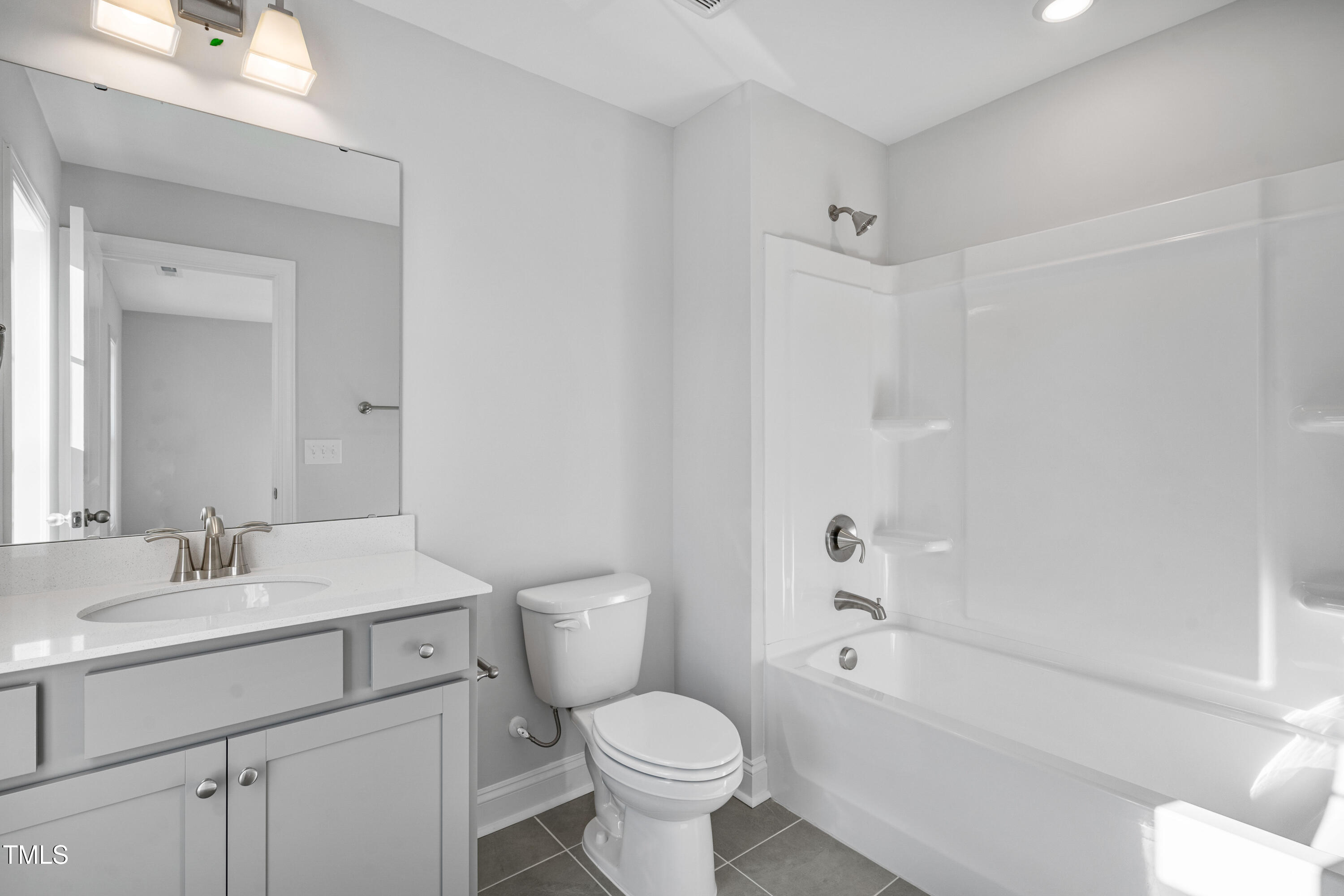 527 Forestville Road Wake Forest, NC 27587 - Photo 41 of 47 a bathroom with a sink toilet and shower