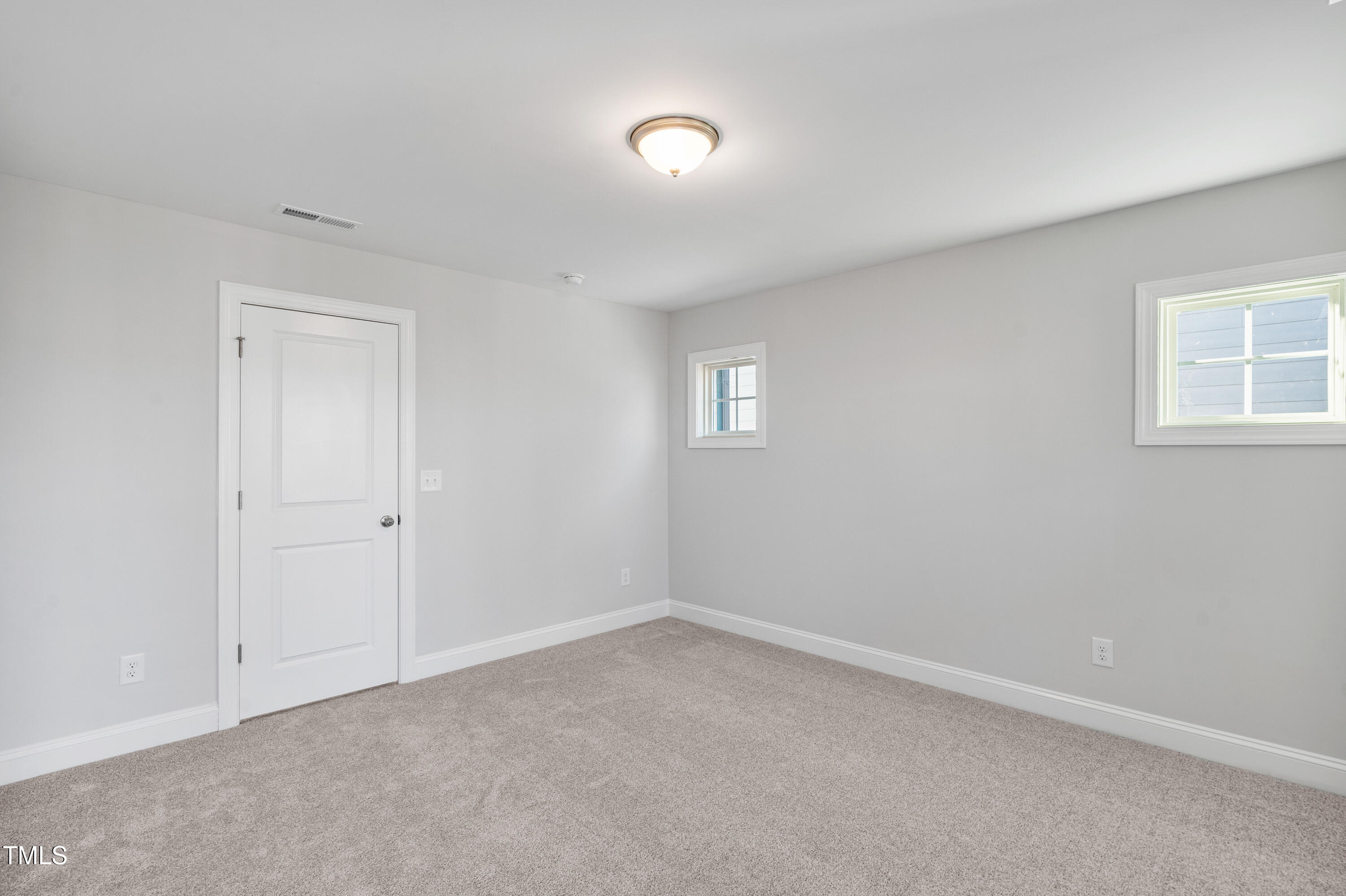 527 Forestville Road Wake Forest, NC 27587 - Photo 45 of 47 a view of an empty room with a window