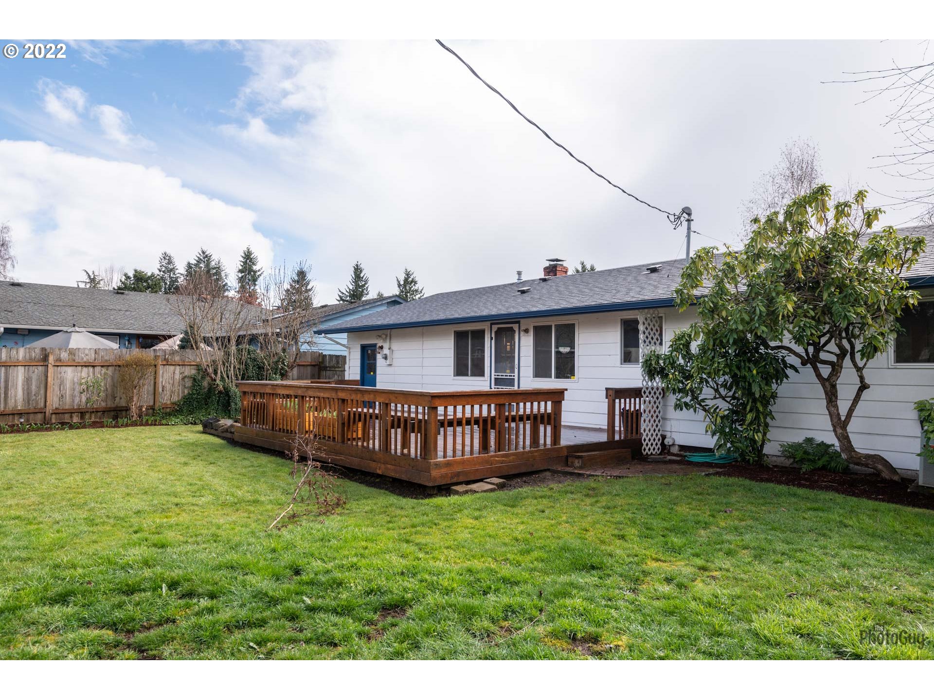 5852 F Street Springfield, OR 97478 - Photo 23 of 26 a view of a house with a yard and sitting area