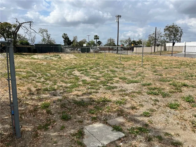 a view of a lake with houses in the back