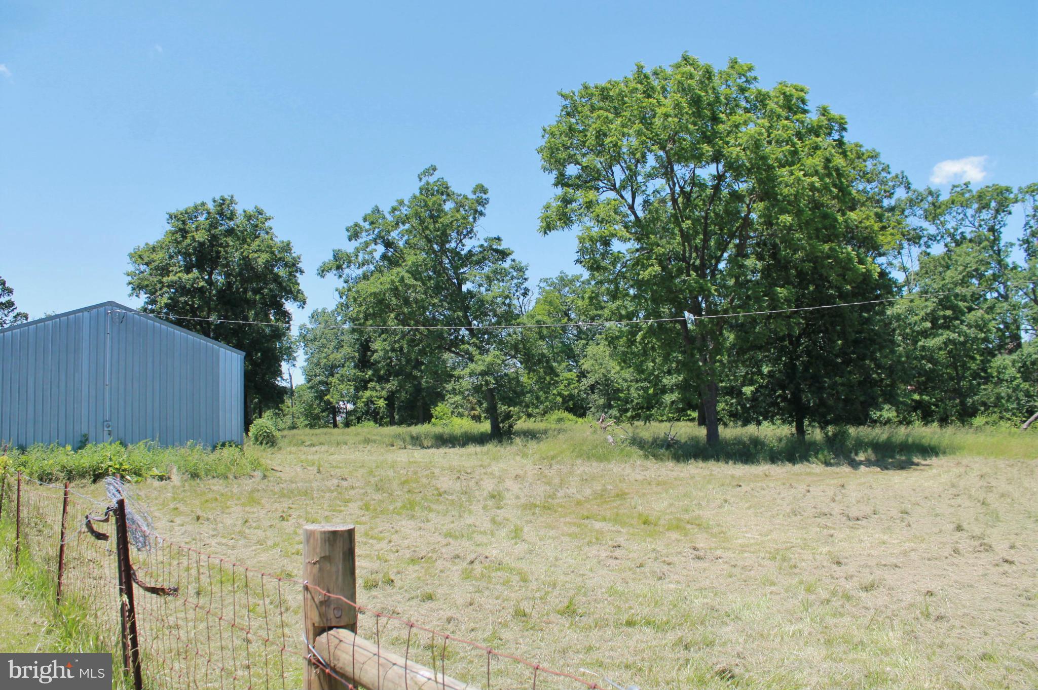 Adjacent lot 2.75 acres.