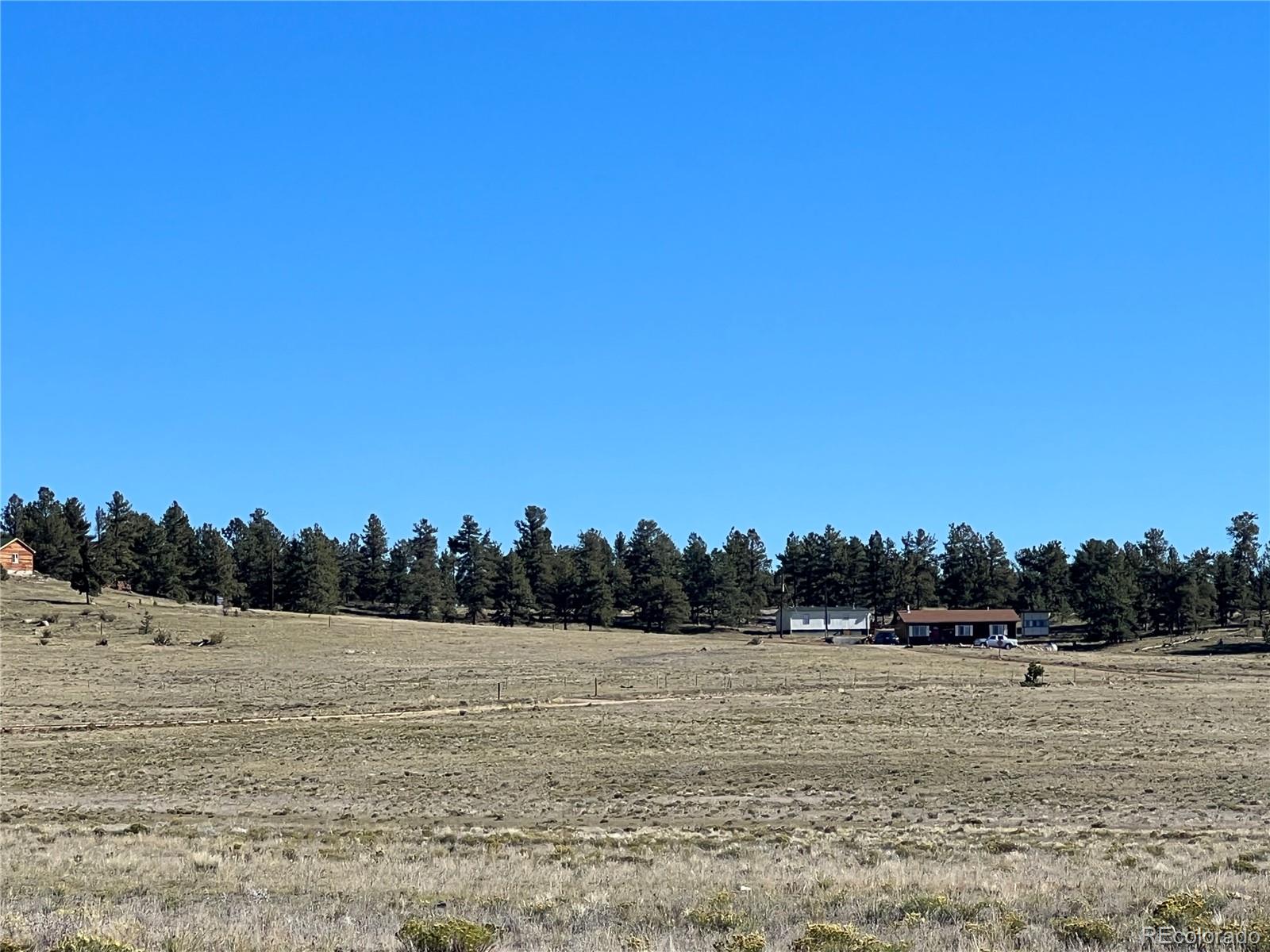 1348 Apache Trail Hartsel, CO 80449 - Photo 21 of 38 a view of an outdoor space and a yard