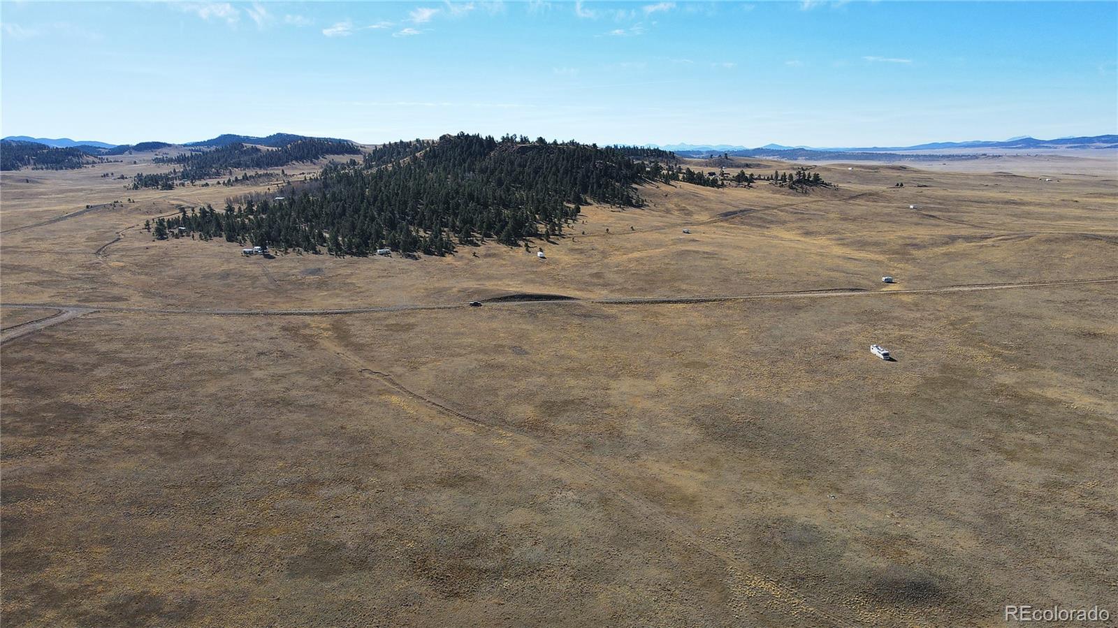 1348 Apache Trail Hartsel, CO 80449 - Photo 33 of 38 a view of a dry yard with mountain
