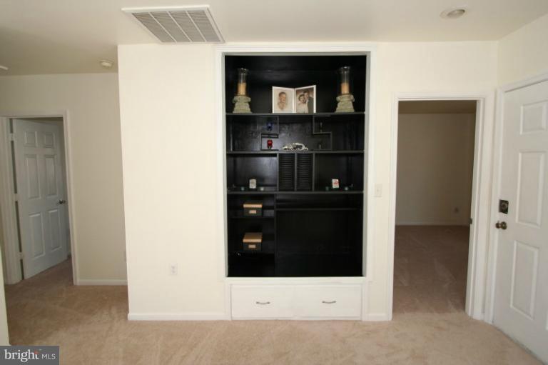 323 Forest Grove Road Colonial Beach, VA 22443 - Photo 9 of 30 Built-in Entertainment Center