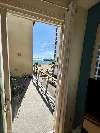 a view of a balcony and chairs