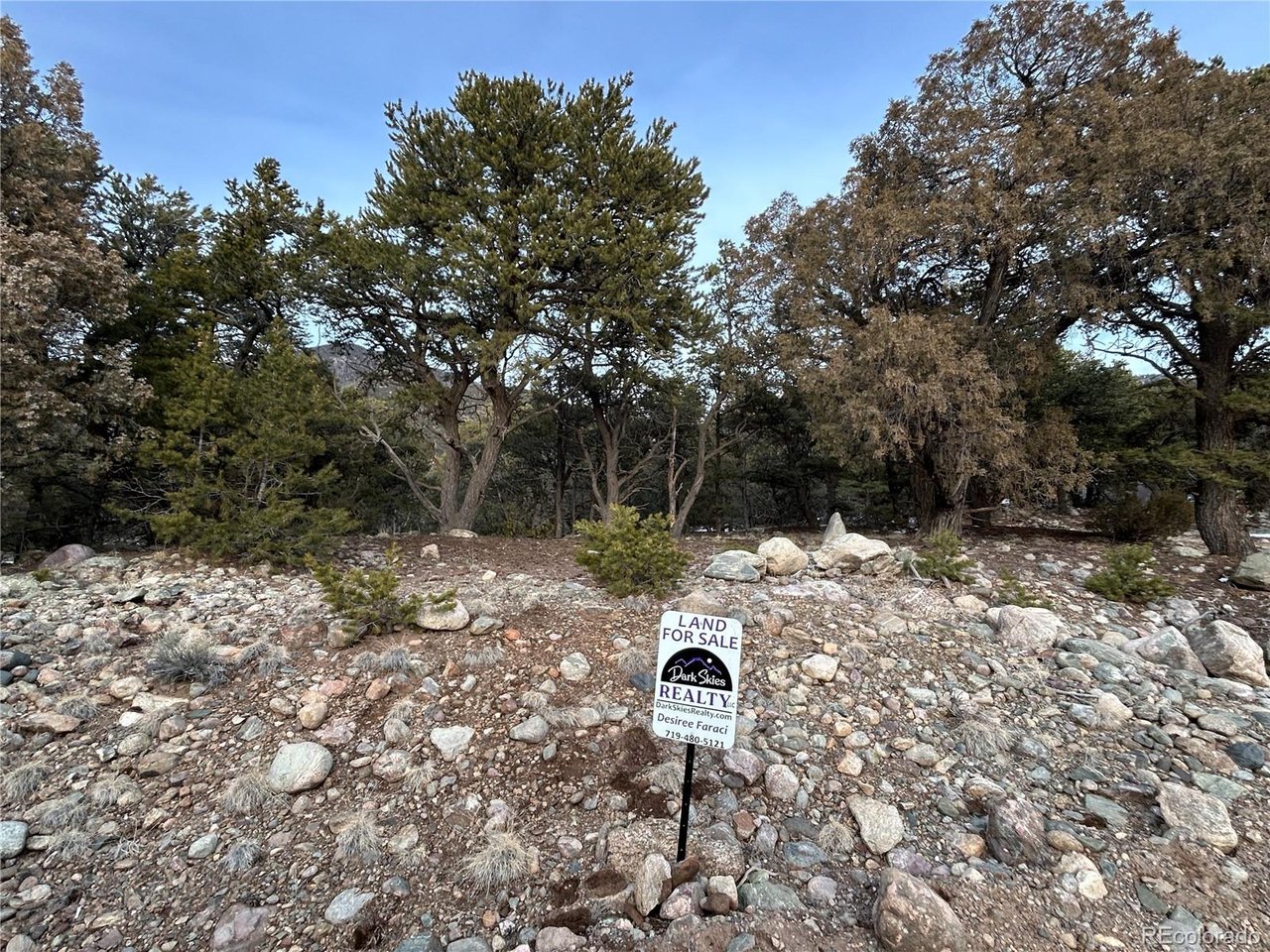 3593 Splendid Way Crestone, CO 81131 - Photo 6 of 8 a backyard of a house with lots of green space