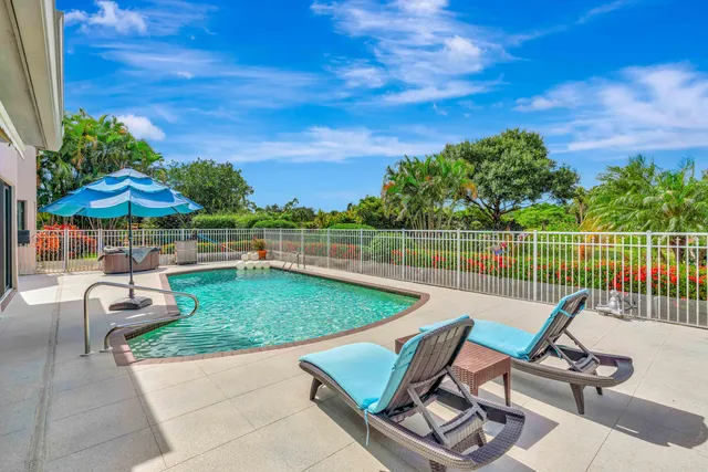 a view of a chairs and table in the terrace