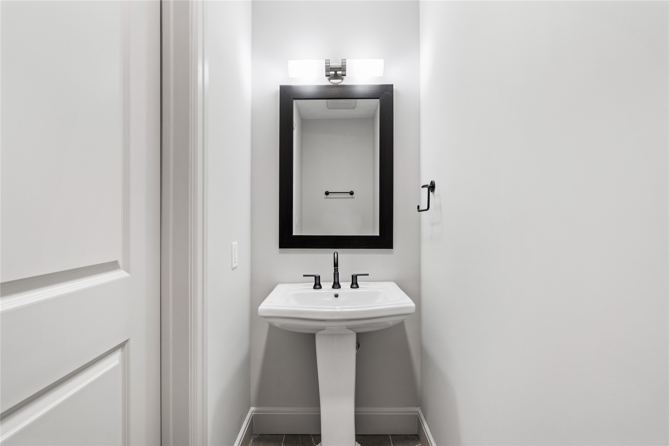 2511 Willowick Road, Unit 117 Houston, TX 77027 - Photo 14 of 43 a bathroom with a sink and a mirror