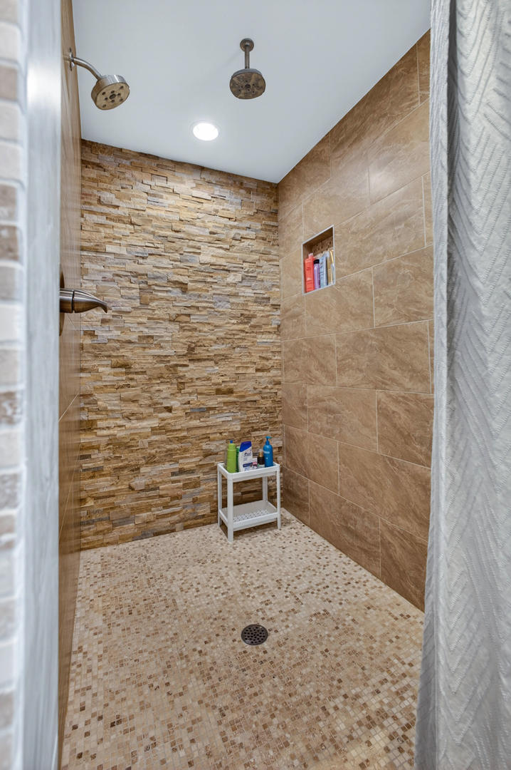5700 Emily Road Bettendorf, IA 52722 - Photo 38 of 58 a bathroom with a shower