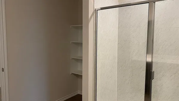 an empty room with an entryway