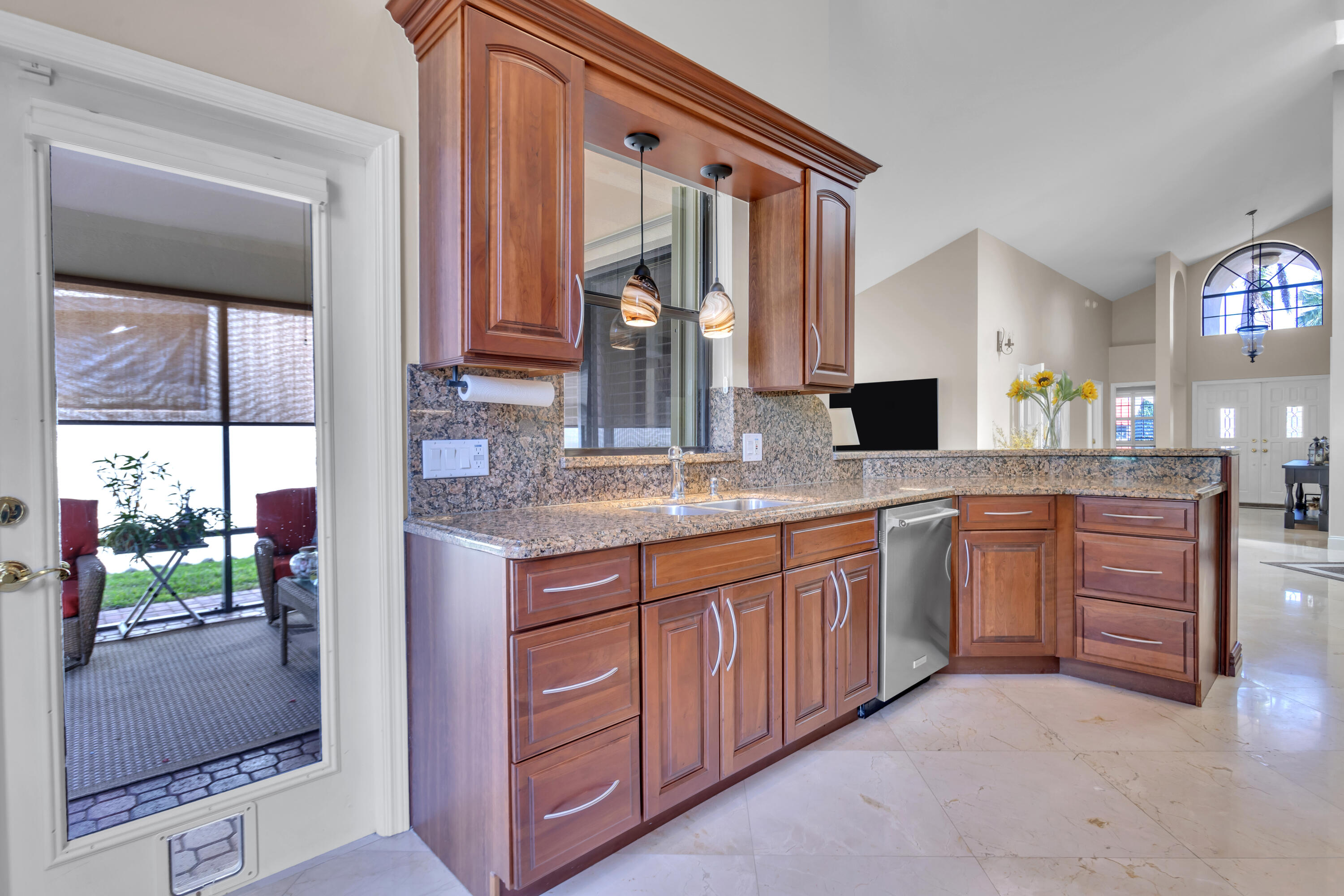 23280 Mirabella Circle North Boca Raton, FL 33433 - Photo 10 of 34 access to patio from kitchen