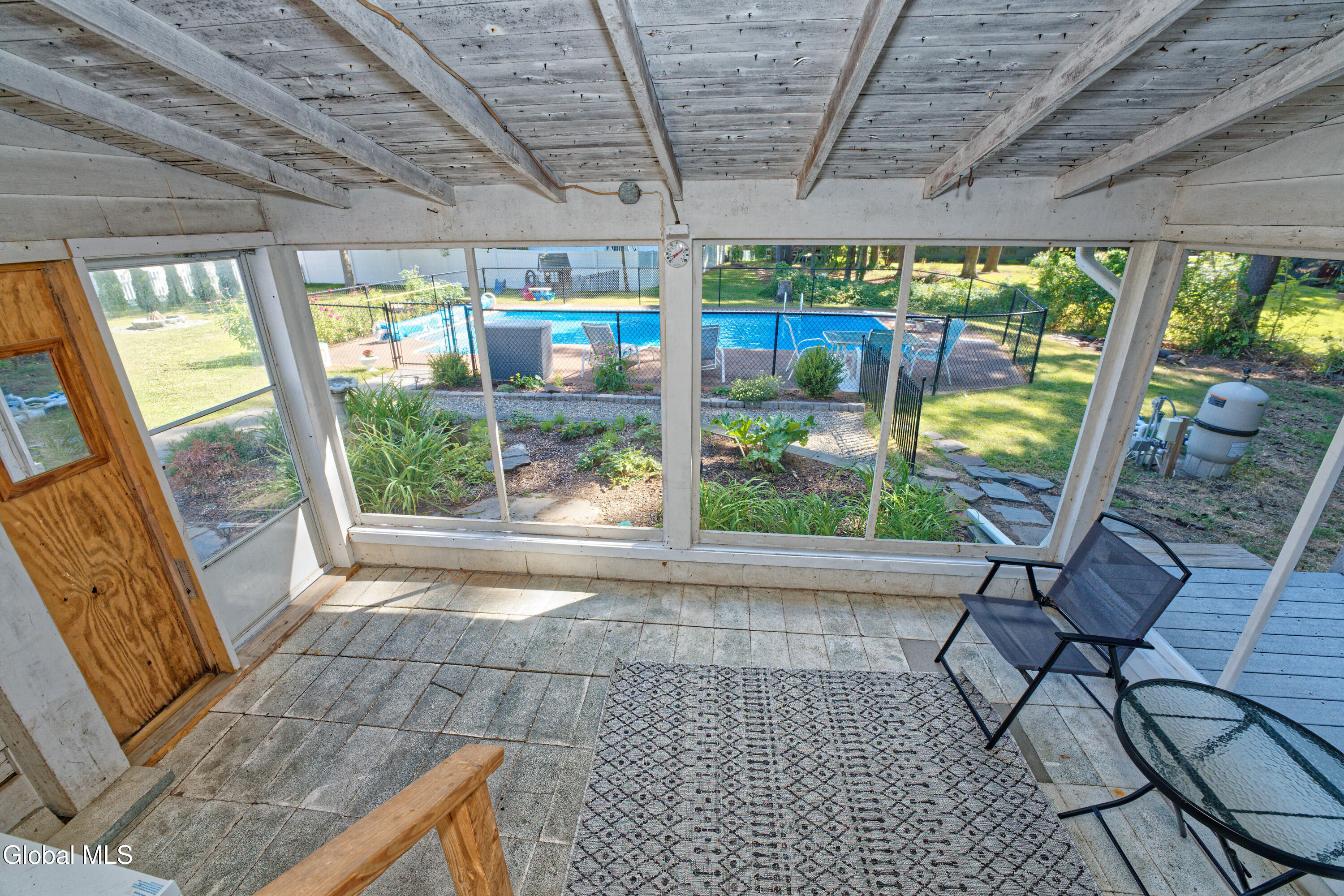 780 Feura Bush Road Bethlehem, NY 12054 - Photo 26 of 39 Screen porch 2