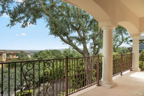 a view of a balcony with lake view