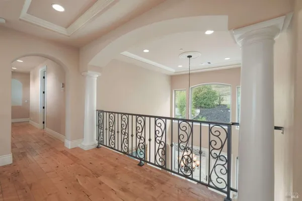 a view of hallway with stairs