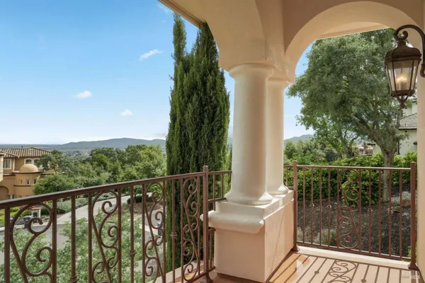 a view of a balcony with an outdoor space