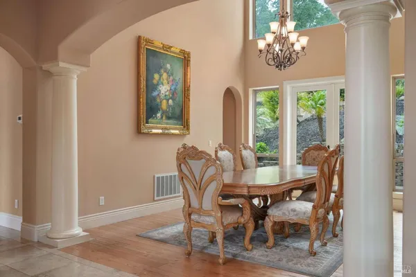 a view of a dining room with furniture window and outside view