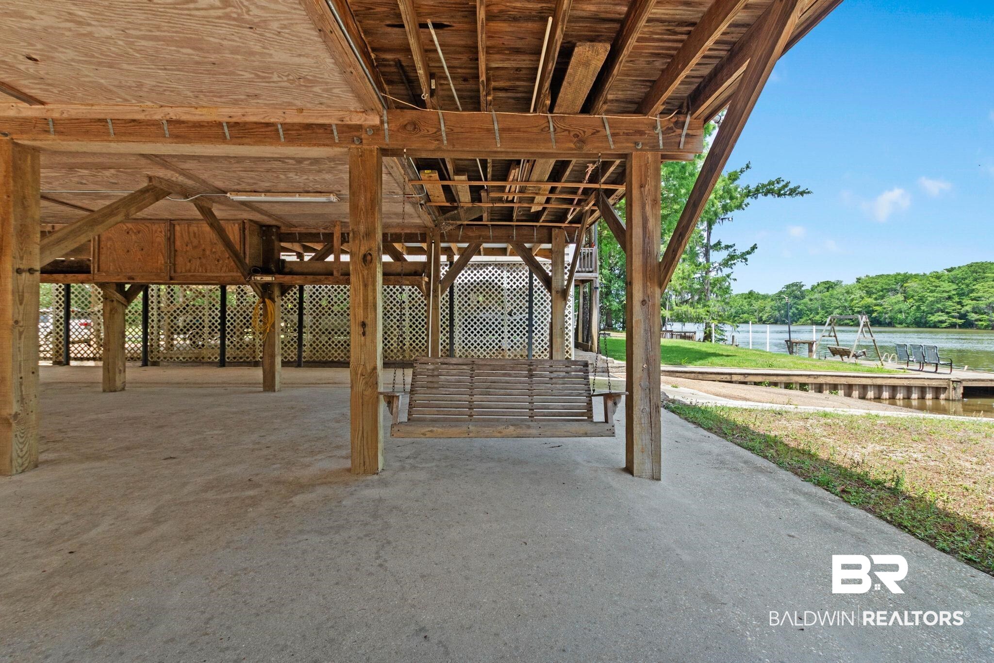 8153 Bryant's Lndg Road Stockton, AL 36579 - Photo 68 of 87 Covered outdoor recreational area with exposed wood beam construction