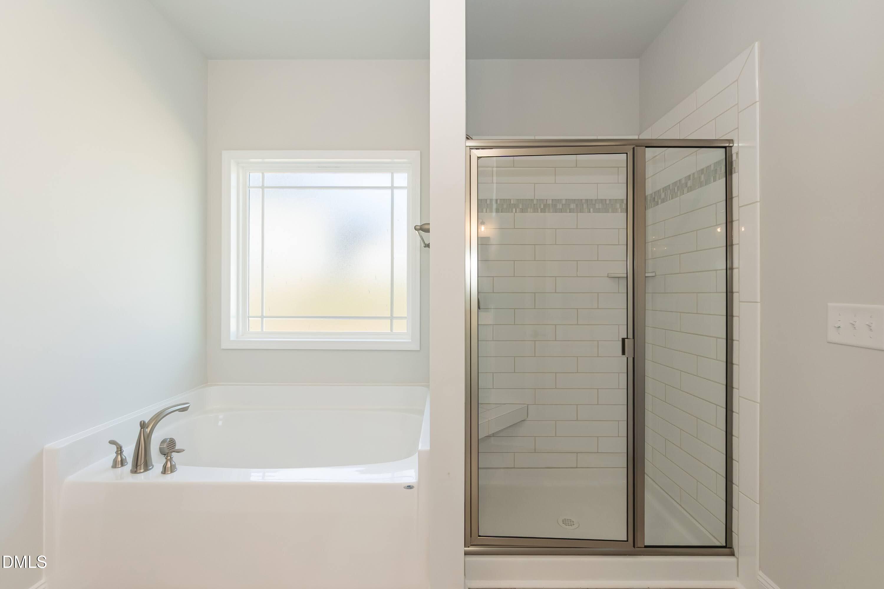 63 Leslie Court Middlesex, NC 27557 - Photo 9 of 21 a bathroom with a bathtub